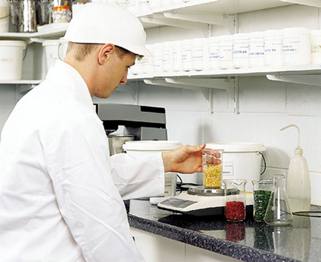 Earlee Products Food Scientist measuring ingrediants