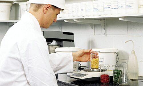 Earlee Products Food Scientist measuring ingrediants
