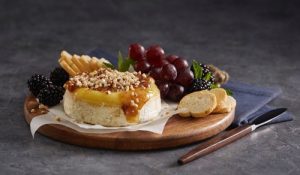 Honey and fig baked brie with specialty stuffing cores, sauce sachets and flavoured butter discs